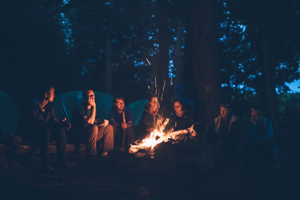 people gathered around a fire